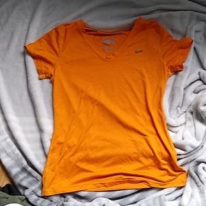 Womens Orange NIKE Dri-Fit shirt